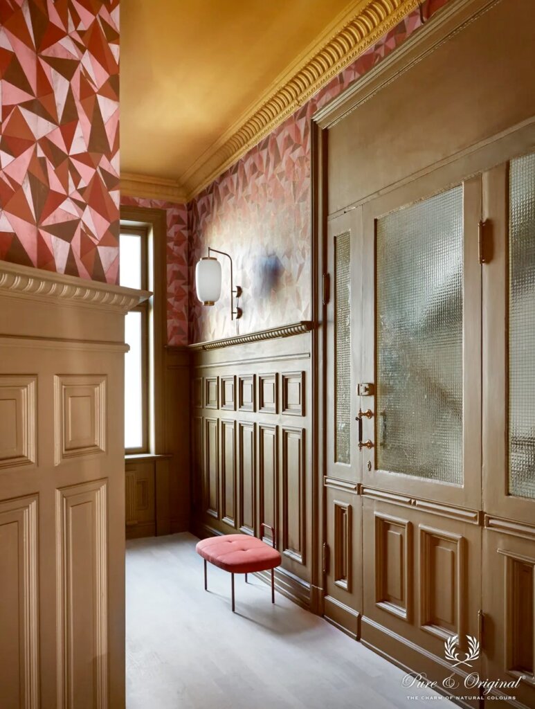 Antique entry way with paneled walls, crown moulding and a ceiling painted Praline by Pure and Original.