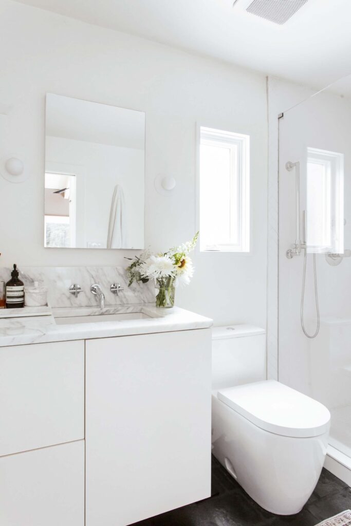 primary suite all white bathroom